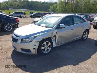2014 Chevrolet Cruze 1LT with VIN 1G1PC5SBXE7320337, listed as a IAAI auction lot 42010404 with 69,270 mi miles and . Bid and sale history available at DreamBid. Image 2.