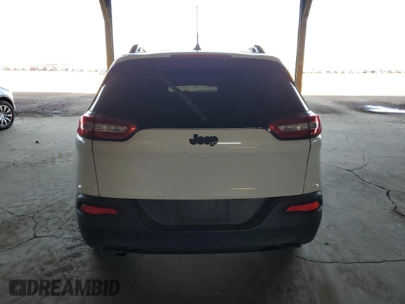 2017 Jeep Cherokee Altitude with VIN 1C4PJLAB3HW661754, listed as a Copart auction lot 64580105 with 62,427 mi miles and Salvage title. Bid and sale history available at DreamBid. Image 6.