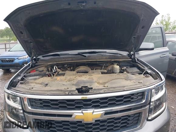 2019 Chevrolet Suburban LT with VIN 1GNSKHKCXKR405555, listed as a IAAI auction lot 42188860 with 143,435 mi miles and . Bid and sale history available at DreamBid. Image 10.