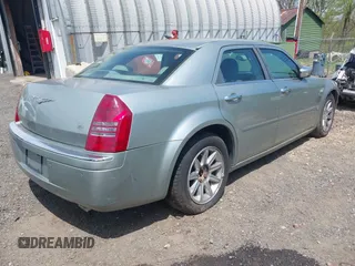 2005 Chrysler 300 with VIN 2C3AA63H65H522824, listed as a IAAI auction lot 42133787 with 266,724 mi miles. Bid and sale history available at carsss.com. Image 4.