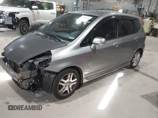 2007 Honda Fit Sport with VIN JHMGD37637S052380, listed as a IAAI auction lot 41219293 with 171,586 mi miles. Bid and sale history available at carsss.com. Image 2.