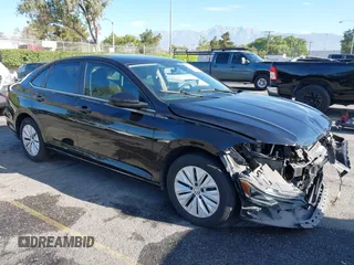 2019 Volkswagen Jetta S z VIN 3VWC57BU3KM056891, wystawiony jako IAAI lot #42677355 z przebiegiem 80 828 mil mil oraz . Historia ofert i sprzedaży dostępna na DreamBid. Obrazek 1.