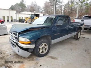 1998 Dodge Dakota SLT with VIN 1B7GL22Y9WS688713, listed as a Copart auction lot 44952955 with 106,102 mi miles and Salvage Title. Bid and sale history available at carsss.com. Image 1.