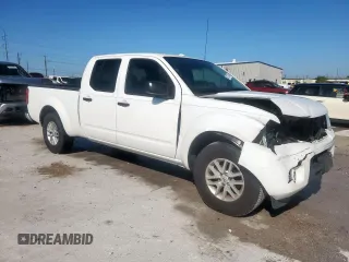 2017 Nissan Frontier SV with VIN 1N6DD0FR7HN745271, listed as a Copart auction lot 52117385 with 63,044 mi miles and Salvage title. Bid and sale history available at DreamBid. Image 4.