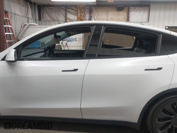 2023 Tesla Model Y Performance with VIN 7SAYGDEF5PF665560, listed as a IAAI auction lot 41809349 with Not Provided miles and . Bid and sale history available at DreamBid. Image 15.
