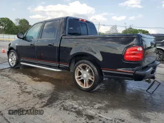 2001 Ford F-150 XLT with VIN 1FTRW07L51KA31353, listed as a Copart auction lot 59724275 with Not provided miles and Salvage title. Bid and sale history available at DreamBid. Image 2.