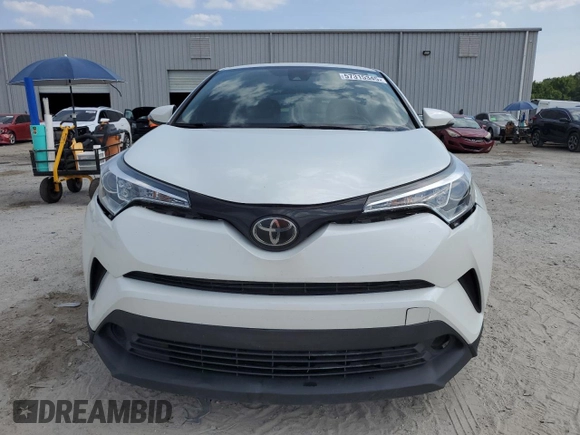 2019 Toyota C-HR XLE z VIN NMTKHMBX5KR079425, wystawiony jako Copart lot #57315345 z przebiegiem 109 441 mil mil oraz Szkoda całkowita • Salvage title. Historia ofert i sprzedaży dostępna na DreamBid. Obrazek 5.