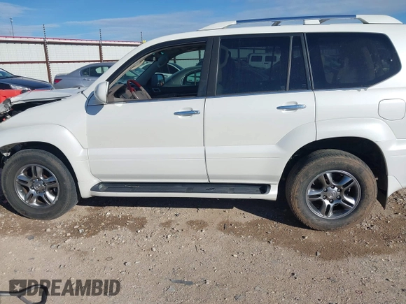 2009 Lexus GX 470 z VIN JTJBT20X390175930, wystawiony jako IAAI lot #41856945 z przebiegiem 207 809 mil mil oraz . Historia ofert i sprzedaży dostępna na DreamBid. Obrazek 14.
