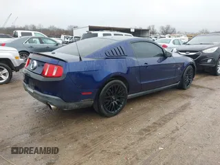 2010 Ford Mustang GT with VIN 1ZVBP8CH0A5121729, listed as a IAAI auction lot 41531080 with 162,673 mi miles. Bid and sale history available at carsss.com. Image 4.