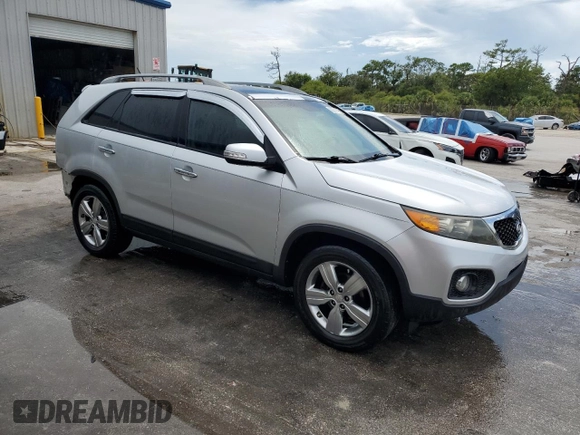 2012 Kia Sorento EX z VIN 5XYKU4A27CG229651, wystawiony jako Copart lot #60314715 z przebiegiem 117 876 mil mil oraz Szkoda całkowita • Salvage title. Historia ofert i sprzedaży dostępna na DreamBid. Obrazek 4.