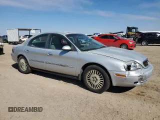 2001 Mercury Sable GS z VIN 1MEFM50U51A644294, wystawiony jako Copart lot #46227205 z przebiegiem 187 759 mil mil oraz Szkoda całkowita • Salvage title. Historia ofert i sprzedaży dostępna na DreamBid. Obrazek 4.