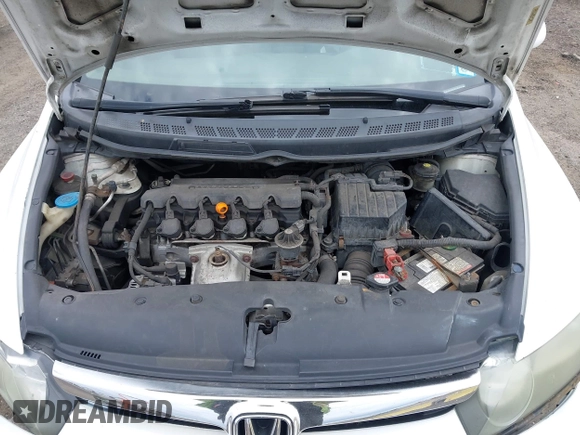2006 Honda Civic LX with VIN 1HGFA16556L084177, listed as a IAAI auction lot 42053325 with 142,664 mi miles and . Bid and sale history available at DreamBid. Image 10.