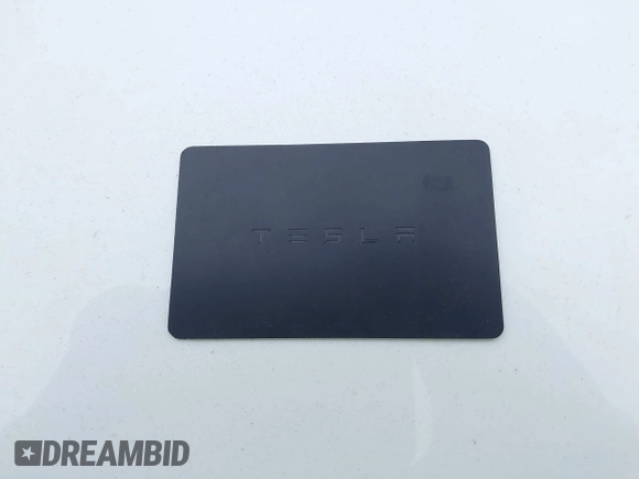 2021 Tesla Model Y Long Range with VIN 5YJYGDEE6MF082883, listed as a IAAI auction lot 42078807 with 64,953 mi miles. Bid and sale history available at carsss.com. Image 11.