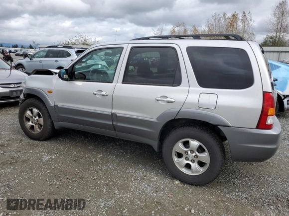 2002 Mazda Tribute LX with VIN 4F2CU08192KM41728, listed as a Copart auction lot 78221954 with 140,782 mi miles and Salvage Title. Bid and sale history available at carsss.com. Image 2.