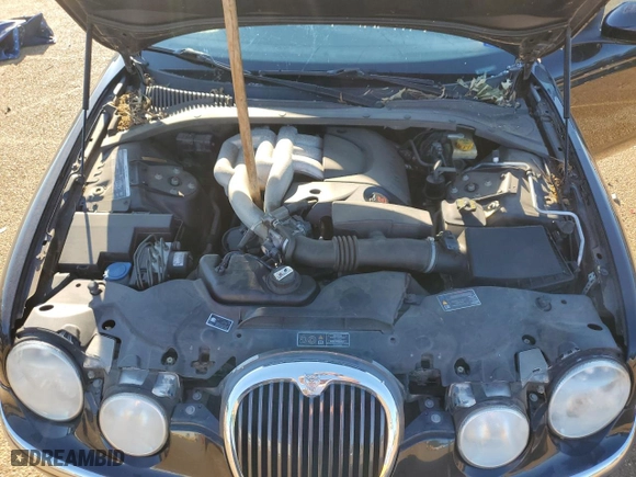 2004 Jaguar S-Type with VIN SAJEA01T04FN08520, listed as a Copart auction lot 58475964 with 67,744 mi miles and Salvage Title. Bid and sale history available at carsss.com. Image 12.