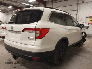2021 Honda Pilot Special Edition z VIN 5FNYF6H26MB086397, wystawiony jako IAAI lot #41162732 z przebiegiem 94 246 mil mil oraz . Historia ofert i sprzedaży dostępna na DreamBid. Obrazek 4.