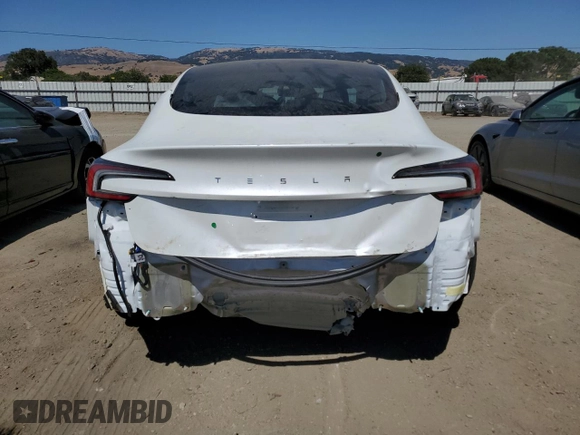 2025 Tesla Model 3 Long Range z VIN 5YJ3E1EAXSF914864, wystawiony jako Copart lot #60901055 z przebiegiem 4 174 mil mil oraz Szkoda całkowita • Salvage title. Historia ofert i sprzedaży dostępna na DreamBid. Obrazek 6.