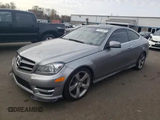 2015 Mercedes-Benz C 350 with VIN WDDGJ8JB2FG404806, listed as a Copart auction lot 77315624 with 64,603 mi miles and Salvage title. Bid and sale history available at DreamBid. Image 1.