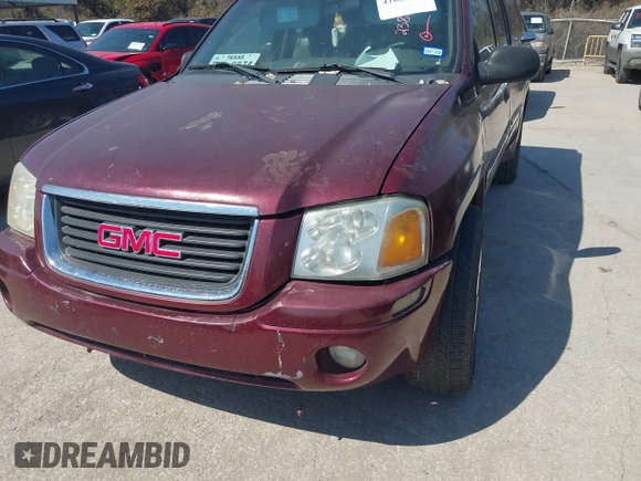 2003 GMC Envoy SLE with VIN 1GKES16S036238094, listed as a IAAI auction lot 41660209 with Not Provided miles and . Bid and sale history available at DreamBid. Image 6.