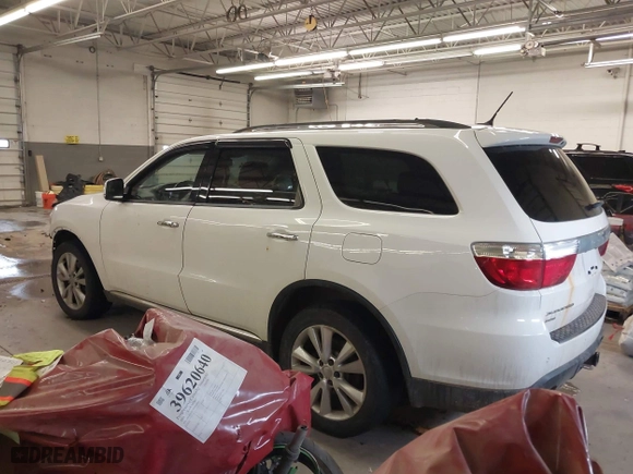 2013 Dodge Durango Crew with VIN 1C4SDJDT1DC540680, listed as a IAAI auction lot 41649262 with 106,016 mi miles. Bid and sale history available at carsss.com. Image 3.