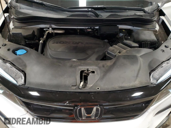 2021 Honda Pilot Special Edition z VIN 5FNYF6H21MB097338, wystawiony jako Copart lot #50345575 z przebiegiem 40 928 mil mil oraz Szkoda całkowita • Salvage title. Historia ofert i sprzedaży dostępna na DreamBid. Obrazek 14.