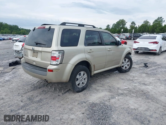 2011 Mercury Mariner z VIN 4M2CN8B72BKJ03915, wystawiony jako IAAI lot #42358251 z przebiegiem 169 206 mil mil oraz . Historia ofert i sprzedaży dostępna na DreamBid. Obrazek 4.