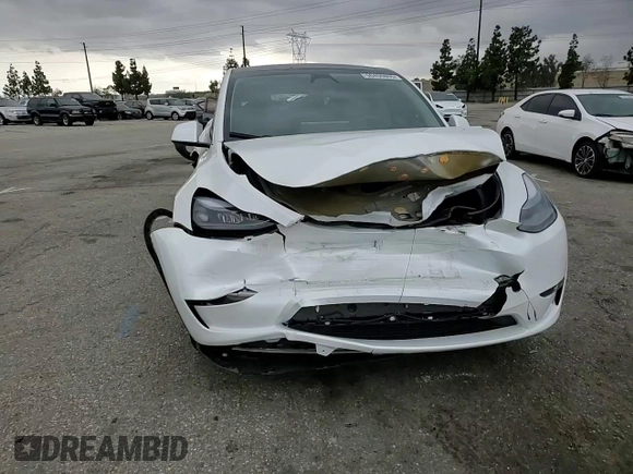 2024 Tesla Model Y Long Range with VIN 7SAYGDEE8RF088808, listed as a Copart auction lot 50406865 with 8,150 mi miles and Salvage title. Bid and sale history available at DreamBid. Image 11.