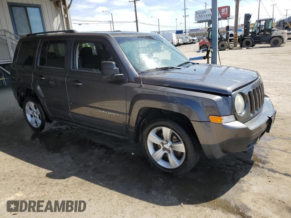 2014 Jeep Patriot Latitude with VIN 1C4NJPFB9ED822901, listed as a Copart auction lot 51005655 with 130,149 mi miles and Salvage Title. Bid and sale history available at carsss.com. Image 4.