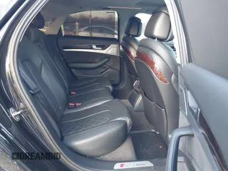 2015 Audi S8 with VIN WAUK2AFD5FN027013, listed as a IAAI auction lot 41456289 with 77,877 mi miles. Bid and sale history available at carsss.com. Image 8.