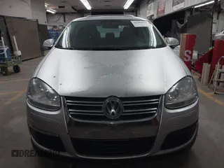 2009 Volkswagen Jetta Sedan SE with VIN 3VWRM71K09M033754, listed as a IAAI auction lot 41949678 with 198,344 mi miles. Bid and sale history available at carsss.com. Image 12.
