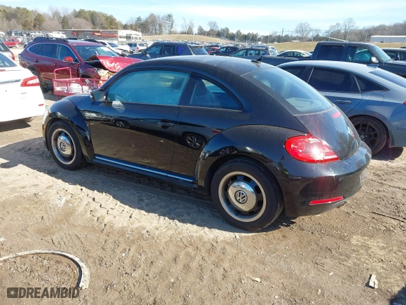 2012 Volkswagen Beetle 2.5L w/Sun/Sound/Nav PZEV with VIN 3VWHP7AT1CM652074, listed as a IAAI auction lot 41374829 with 1 mi miles. Bid and sale history available at carsss.com. Image 3.