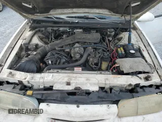 1994 Ford Thunderbird LX with VIN 1FALP62W6RH206764, listed as a Copart auction lot 44213965 with 105,353 mi miles and Salvage Title. Bid and sale history available at DreamBid. Image 11.