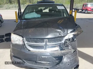 2012 Dodge Grand Caravan SE with VIN 2C4RDGBG9CR351921, listed as a IAAI auction lot 42110545 with 89,194 mi miles and . Bid and sale history available at DreamBid. Image 6.