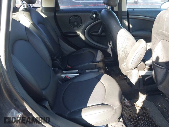 2011 MINI Countryman S with VIN WMWZC5C54BWL55124, listed as a IAAI auction lot 41666874 with 197,656 mi miles and . Bid and sale history available at DreamBid. Image 8.
