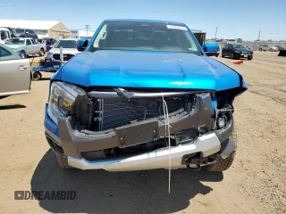 2025 Ford Ranger Lariat with VIN 1FTER4KH9SLE17446, listed as a Copart auction lot 61853775 with 1,810 mi miles and Salvage title. Bid and sale history available at DreamBid. Image 5.
