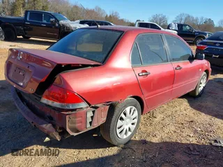 2006 Mitsubishi Lancer ES with VIN JA3AJ26E16U069683, listed as a IAAI auction lot 41687713 with 176,804 mi miles. Bid and sale history available at carsss.com. Image 4.