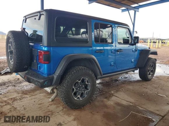 2023 Jeep Wrangler Rubicon with VIN 1C4JJXR69PW581362, listed as a Copart auction lot 58557795 with 34,357 mi miles and Salvage title. Bid and sale history available at DreamBid. Image 3.