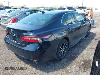 2021 Toyota Camry SE Nightshade with VIN 4T1G11AK5MU404780, listed as a IAAI auction lot 41897739 with 94,320 mi miles and . Bid and sale history available at carsss.com. Image 4.
