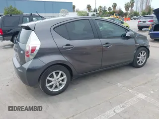 2013 Toyota Prius One with VIN JTDKDTB34D1047568, listed as a IAAI auction lot 41950373 with 99,319 mi miles and . Bid and sale history available at carsss.com. Image 4.