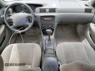 2001 Toyota Camry CE z VIN 4T1BG22KX1U085868, wystawiony jako Copart lot #58100375 z przebiegiem 122 886 mil mil oraz Szkoda całkowita • Salvage title. Historia ofert i sprzedaży dostępna na DreamBid. Obrazek 8.