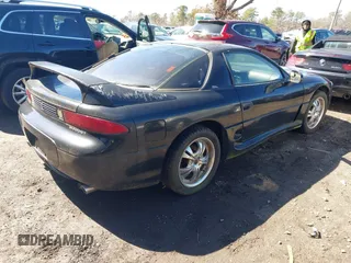 1999 Mitsubishi 3000GT GT z VIN JA3AM84JXXY001953, wystawiony jako IAAI lot #41834925 z przebiegiem 132 335 mil mil oraz . Historia ofert i sprzedaży dostępna na DreamBid. Obrazek 4.