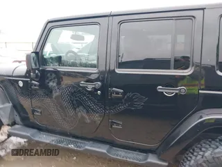 2014 Jeep Wrangler Unlimited Sahara with VIN 1C4HJWEG1EL202974, listed as a IAAI auction lot 41591870 with 17,174 mi miles. Bid and sale history available at carsss.com. Image 15.