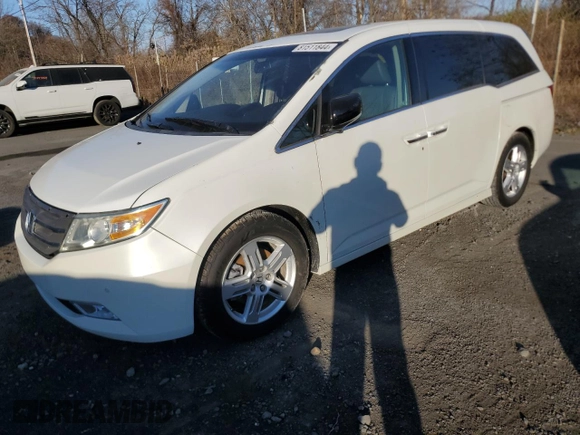 2012 Honda Odyssey Touring with VIN 5FNRL5H96CB144690, listed as a Copart auction lot 81511844 with 44,030 mi miles and Salvage Title. Bid and sale history available at carsss.com. Image 1.
