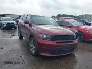 2019 Dodge Durango GT Plus z VIN 1C4RDJDG9KC780302, wystawiony jako IAAI lot #41554608 z przebiegiem 98 720 mil mil oraz . Historia ofert i sprzedaży dostępna na DreamBid. Obrazek 1.