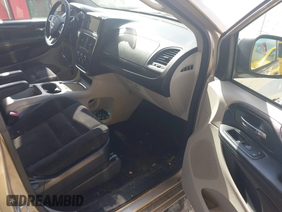 2014 Dodge Grand Caravan SXT with VIN 2C4RDGCG8ER244201, listed as a IAAI auction lot 42017091 with 161,653 mi miles and . Bid and sale history available at DreamBid. Image 5.