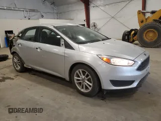 2018 Ford Focus SE z VIN 1FADP3F24JL315154, wystawiony jako Copart lot #53609185 z przebiegiem 76 216 mil mil oraz Szkoda całkowita • Salvage title. Historia ofert i sprzedaży dostępna na DreamBid. Obrazek 4.