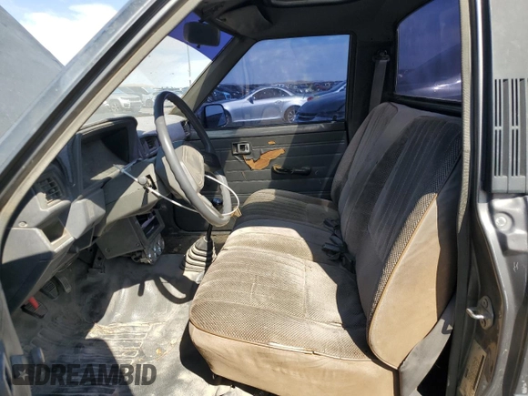 1987 Toyota Pickup with VIN JT4RN50R5H0228706, listed as a Copart auction lot 50639045 with 296,043 mi miles and Salvage Title. Bid and sale history available at DreamBid. Image 7.