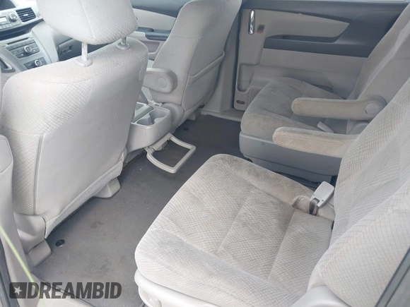 2014 Honda Odyssey LX z VIN 5FNRL5H27EB007683, wystawiony jako IAAI lot #42427304 z przebiegiem 325 359 mil mil oraz . Historia ofert i sprzedaży dostępna na DreamBid. Obrazek 8.