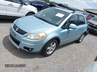 2009 Suzuki SX4 Touring AWD z VIN JS2YB417096201672, wystawiony jako IAAI lot #42209018 z przebiegiem 64 879 mil mil oraz . Historia ofert i sprzedaży dostępna na DreamBid. Obrazek 2.