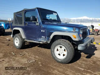 2003 Jeep Wrangler X z VIN 1J4FA39S43P338732, wystawiony jako Copart lot #56315495 z przebiegiem 135 480 mil mil oraz Szkoda całkowita • Salvage title. Historia ofert i sprzedaży dostępna na DreamBid. Obrazek 4.